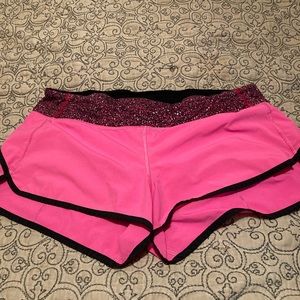 Pink lululemon running shorts